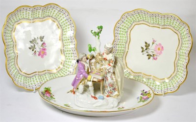 Lot 278 - Two Nantgarw style square dishes, a French meat plate and a German figure group