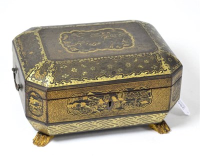 Lot 285 - A Chinese black lacquered sewing box with gilt decoration