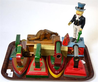 Lot 292 - Cast iron ";Uncle Sam"; money box (reproduction), five painted Victorian flat irons, a small...