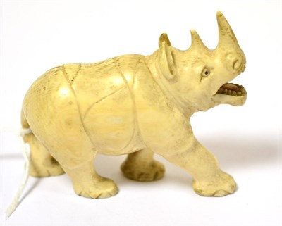 Lot 314 - A carved ivory figure of a rhino, circa 1910