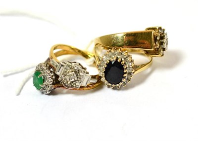 Lot 362 - An emerald and diamond cluster ring and a diamond ring, both stamped '18ct & PLAT', a 9ct gold...