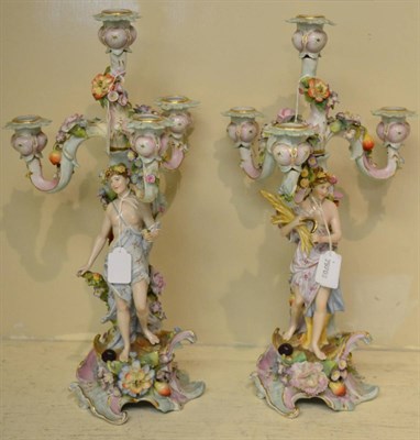 Lot 372 - A pair of 19th century German porcelain candelabra