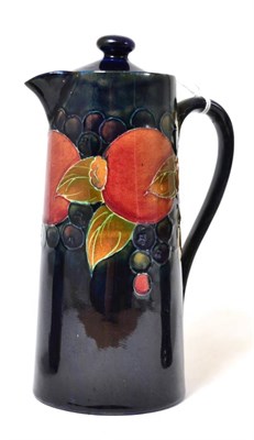 Lot 393 - A William Moorcroft Pomegranate pattern coffee pot with later cover, on a blue ground,...