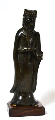 Lot 402 - A Chinese bronze figure of a scholar, Qing dynasty, probably 17th/18th century, on wood stand