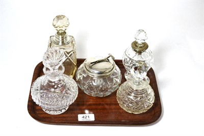 Lot 421 - Two silver mounted cut glass scent bottles and covers, two others and a silver mounted cut...