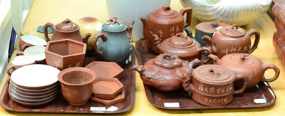 Lot 428 - A quantity of Chinese Yixing tea wares including gourd form and other teapots, etc (on two trays)