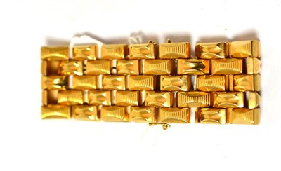 Lot 472 - A chunky bracelet, stamped '18K'