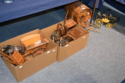 Lot 1004 - A large wooden cart model together with a scale model of a stage coach and a group of four...