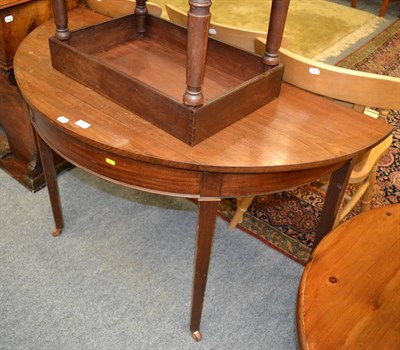 Lot 1029 - A mahogany D-shaped table