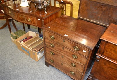 Lot 1031 - A reproduction bow fronted sideboard of small proportions together with a commode