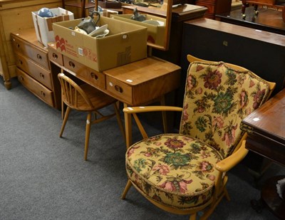 Lot 1036 - An Ercol three piece bedroom suite comprising dressing table and stool, chest of drawers and double