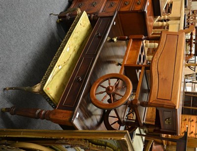 Lot 1043 - A modern wooden drinks trolley together with an onyx topped gilt metal coffee table