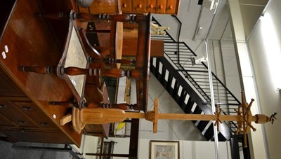 Lot 1053 - A mahogany framed two tier washstand with marble mounts and an oak coat rack with cherub surmount