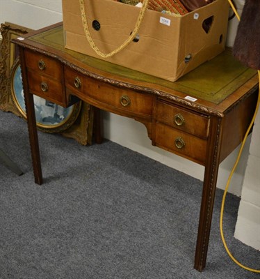 Lot 1065 - Leather topped writing table