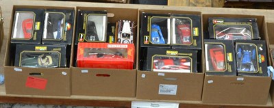 Lot 1085 - Four boxes of a quantity of boxed model vehicles including Bburago, Tonka, etc (approx 24)