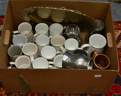 Lot 1088 - A quantity of various novelty tankards together with a Middle Eastern brass tray