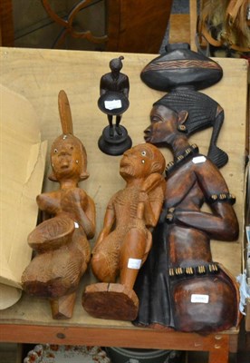 Lot 1090 - Three tribal carvings and a cold painted bronze figure (4)