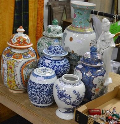 Lot 1114 - A quantity of modern decorative Oriental ceramics including three baluster jars and covers, a large