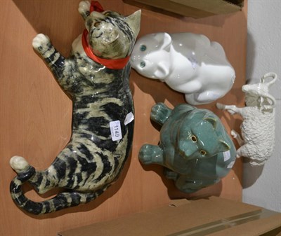 Lot 1149 - Three Winstanley style pottery cat models together with a pottery model of a ram (4)