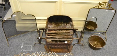 Lot 1171 - Iron fire grate and dogs, two fire screens and a jam pan