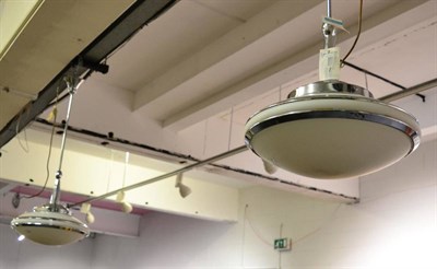 Lot 1180 - A pair of chrome ceiling lights with opaque glass and chrome shades