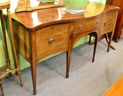 Lot 1246 - A George III checkered string inlaid mahogany bow fronted sideboard