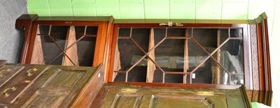 Lot 1256 - A mahogany astragal glazed standing corner cabinet