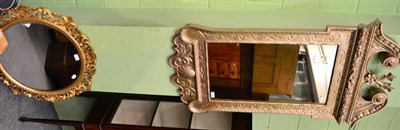 Lot 1259 - A modern gilt framed circular wall mirror and another with a silvered finish