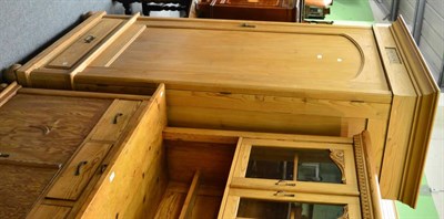 Lot 1267 - A large pine wardrobe