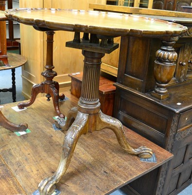 Lot 1279 - A mahogany tip-top tripod occasional table with pie crust edge