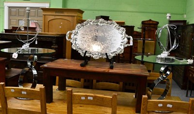 Lot 1285 - Pair of modern chrome spherical occasional tables with glass tops and similar table lamps (4)