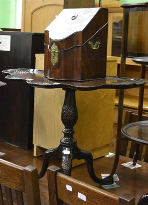 Lot 1291 - A George III mahogany knife box and a carved mahogany tripod occasional table