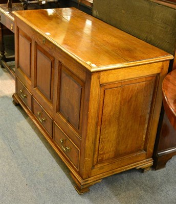 Lot 1298 - A Georgian oak and mahogany crossbanded mule chest