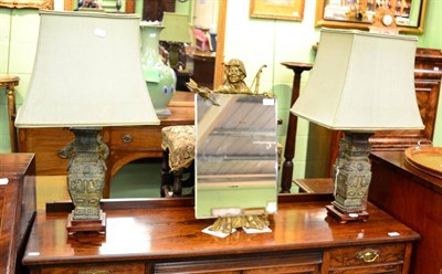 Lot 1305 - A pair of modern Chinese bronzed urn form table lamps with shades