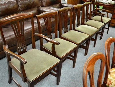 Lot 1310 - A set of six 19th century mahogany dining chairs including two carvers, with drop in seats