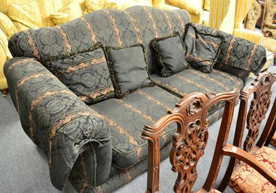 Lot 1330 - A modern ";Medallion"; two seater settee in a grey damask striped upholstery