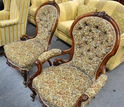 Lot 1332 - A Victorian walnut carved open armchair and a similarly upholstered nursing chair