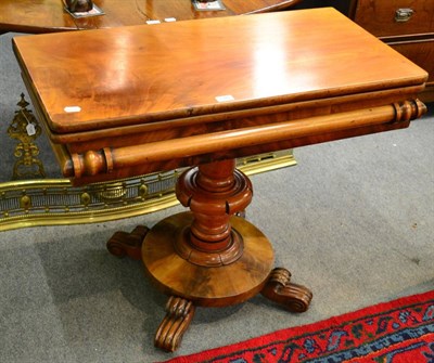 Lot 1340 - A Victorian mahogany pedestal fold-over tea table