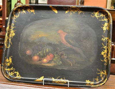 Lot 1349 - A Victorian painted and gilded papier mâché tray decorated with a bird and fruit