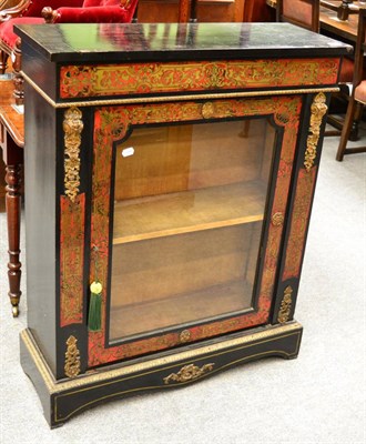 Lot 1352 - An Empire style ebonised and red boulle glazed cabinet with gilt metal mounts