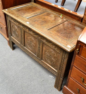 Lot 1356 - A late 18th century carved oak coffer