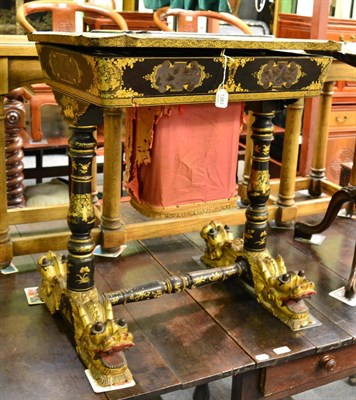 Lot 1361 - A mid 19th century Chinese export gilt lacquer work table, decorated allover with figures and...