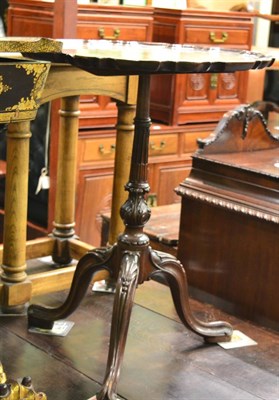 Lot 1362 - 19th century mahogany tripod table with carved decoration