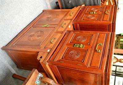 Lot 1372 - A modern Chinese sideboard with three drawers and a pair of modern Chinese small cabinets