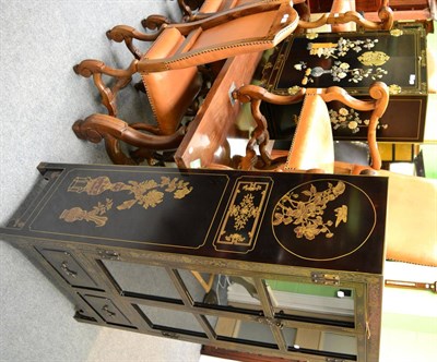 Lot 1374 - A modern Chinese ebonised glazed cabinet with gilt decoration and a smaller cupboard with brass...