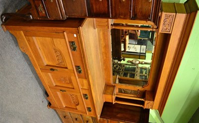 Lot 1389 - A large late 19th century light oak mirrored back sideboard with Art Nouveau motifs and...