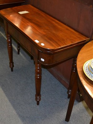 Lot 1401 - A 19th century mahogany fold-over tea table