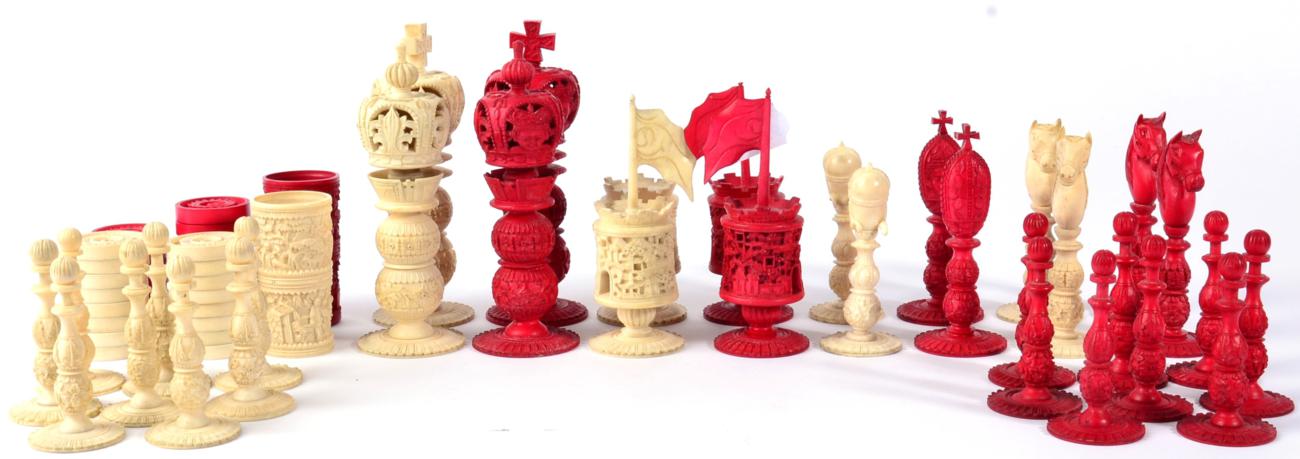 Lot 20 - A Chinese Export Stained and Natural Ivory Chess Set, 19th century, of Burmese pattern, kings...