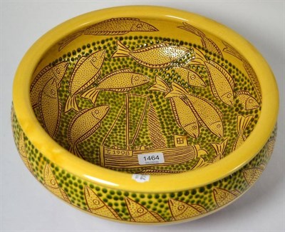 Lot 1464 - A slipware bowl decorated with fish and a trawler, dated 1998, 36cm diameter