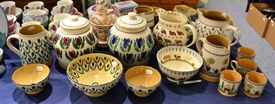 Lot 1472 - A quantity of Nicholas Mosse and Brixton pottery (23)